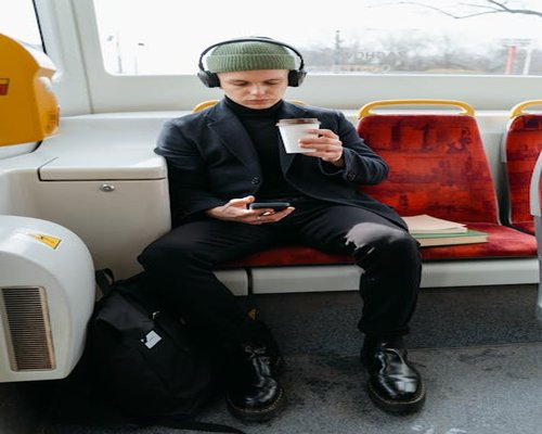 A person commuting on public transport looking relaxed